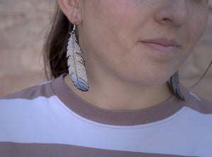 Arete de plumas